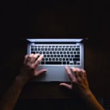 keyboard and notebook representing spelljacking